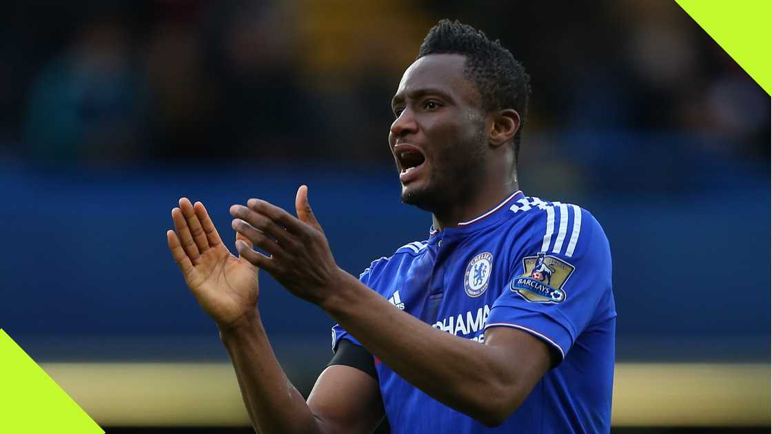 Mikel Obi reaches out to Enzo Fernandez. Mikel Obi reaches out to Enzo Fernandez.