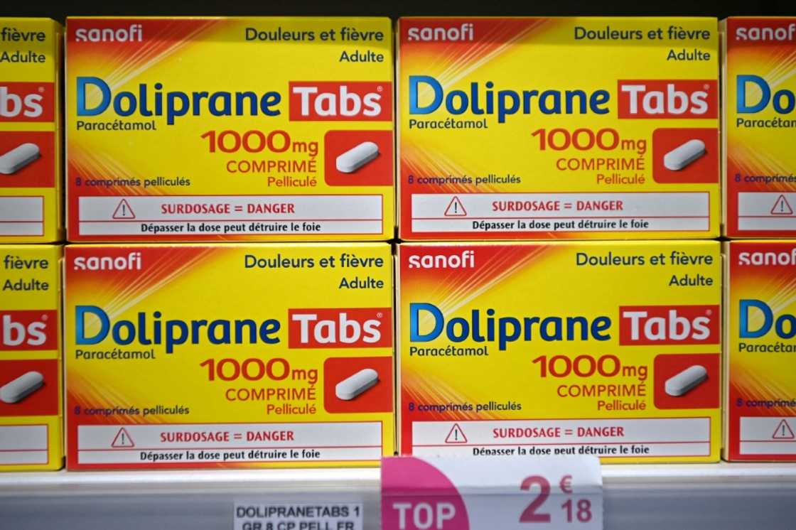 This photograph taken on March 23, 2023, shows doliprane boxes on a pharmacy shelf, in Colomiers, southwestern France.