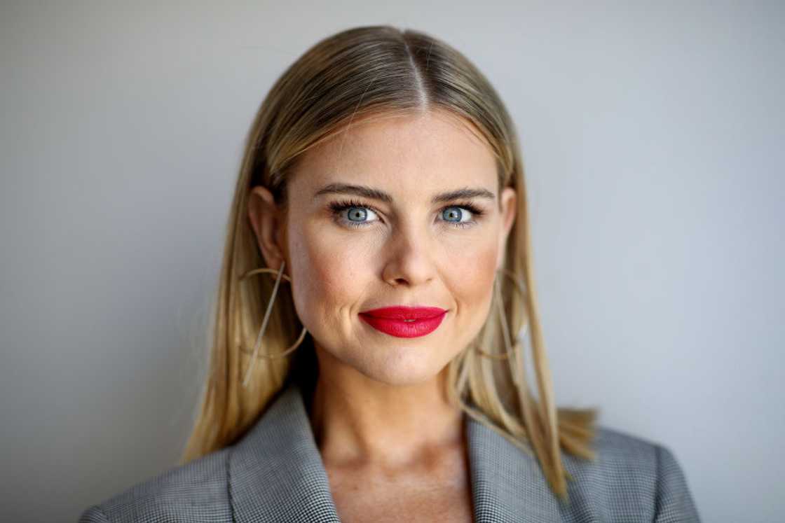 Tegan Martin in red lipstick and grey coat Tegan Martin in red lipstick and grey coat