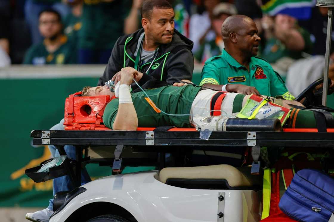 South Africa scrum-half Faf de Klerk is taken off on a stretcher after being injured during the Rugby Championship match against New Zealand in Mbombela on August 6, 2022. South Africa scrum-half Faf de Klerk is taken off on a stretcher after being injured during the Rugby Championship match against New Zealand in Mbombela on August 6, 2022.
