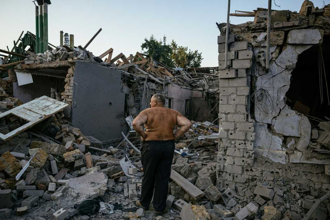 Oleksandr Shulga looks at his destroyed house following a missile strike in Mykolaiv on August 29, 2022 Oleksandr Shulga looks at his destroyed house following a missile strike in Mykolaiv on August 29, 2022
