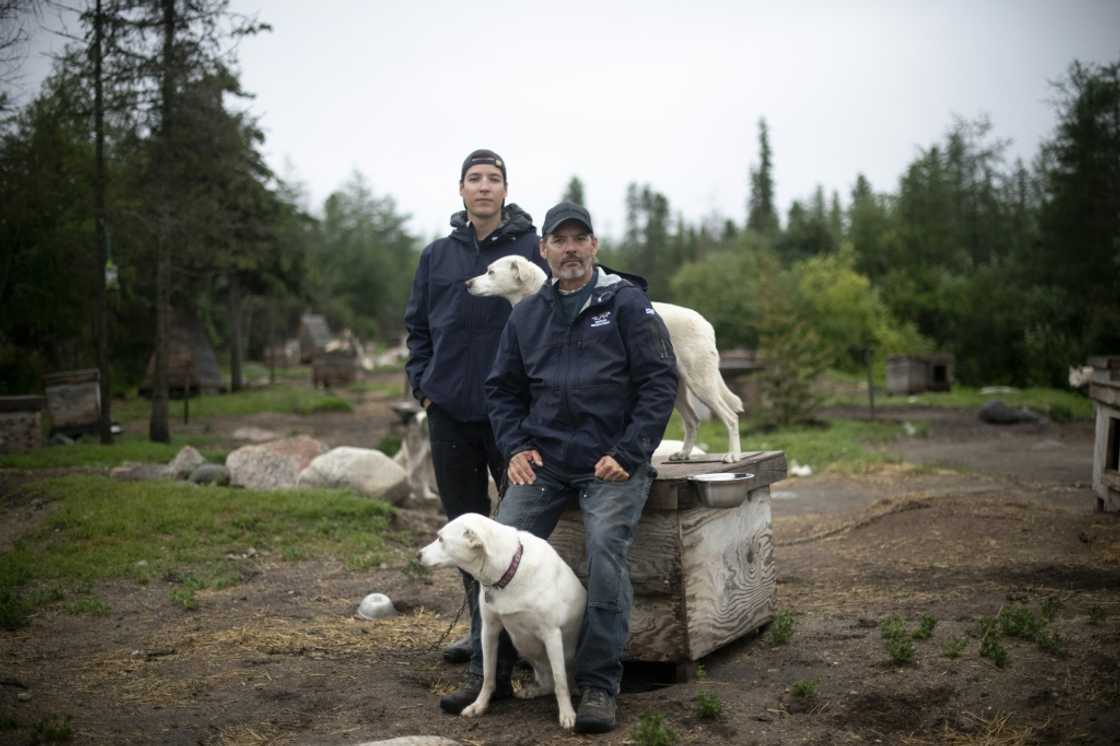 Canadian musher David Daley, pictured with his son Wyatt Daley in Churchill, northern Canada, lives where the tundra ends and the boreal forest begins Canadian musher David Daley, pictured with his son Wyatt Daley in Churchill, northern Canada, lives where the tundra ends and the boreal forest begins