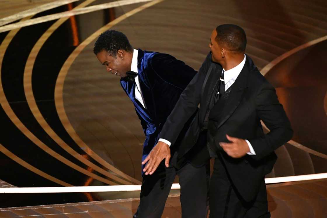 Will Smith marched onto stage during the Oscars ceremony broadcast live around the world and hit the comedian Chris Rock, over a joke about the star's wife Will Smith marched onto stage during the Oscars ceremony broadcast live around the world and hit the comedian Chris Rock, over a joke about the star's wife