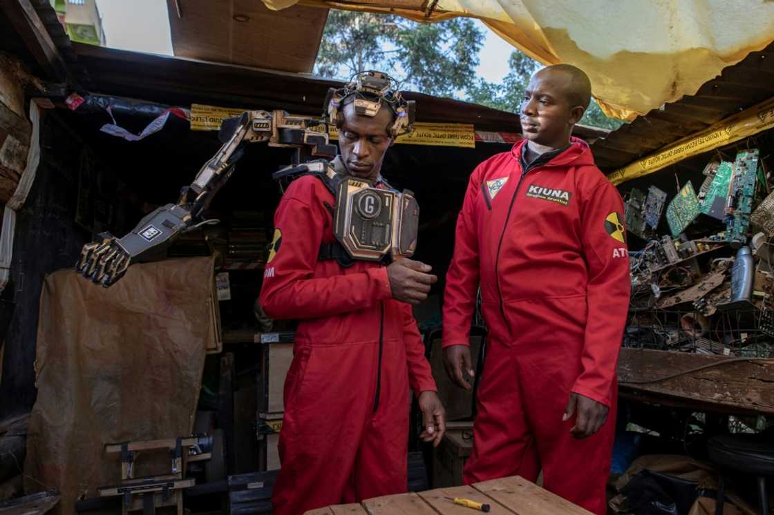 David Gathu, left, and Moses Kiuna are self-taught Kenyan innovators who have built a bio-robotic prosthetic arm out of electronic scrap David Gathu, left, and Moses Kiuna are self-taught Kenyan innovators who have built a bio-robotic prosthetic arm out of electronic scrap