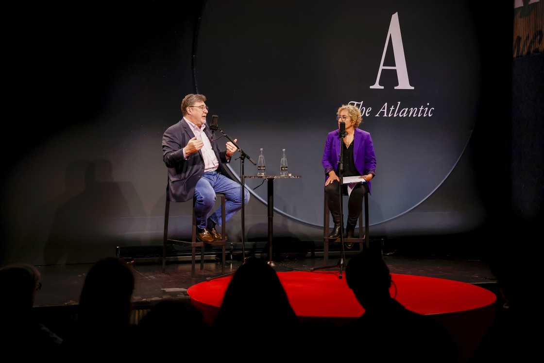 Tom Nichols and Hanna Rosin speak on stage during the "Radio Atlantic: Live" panel for The Atlantic Festival in Washington