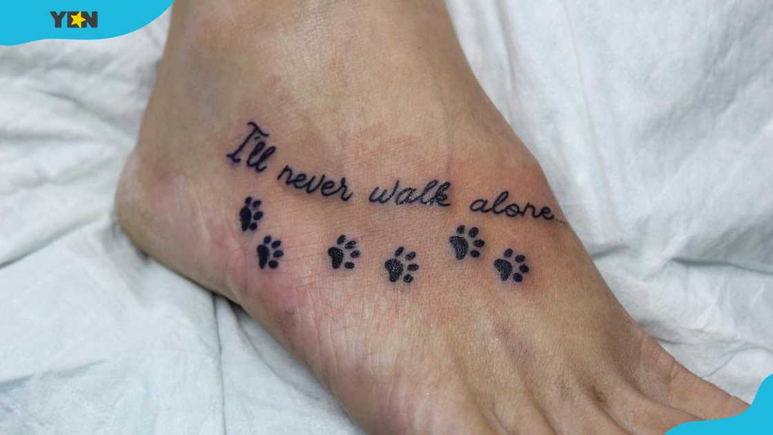 A footprint trail with a quote dog memorial tattoo A footprint trail with a quote dog memorial tattoo