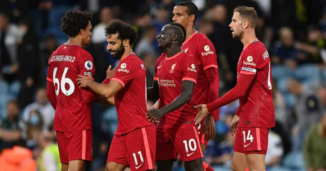 Sadio Mane of Liverpool celebrates with teammates after scoring his side's third goal during the Premier League match between Leeds United and Liverpool at Elland Road on September 12, 2021 in Leeds, England. (Photo by Shaun Botterill/Getty Images)