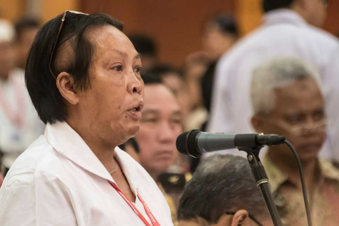 Chusnul Chotimah has suffered 70 percent burns that have left visible scars across her face and body Chusnul Chotimah has suffered 70 percent burns that have left visible scars across her face and body