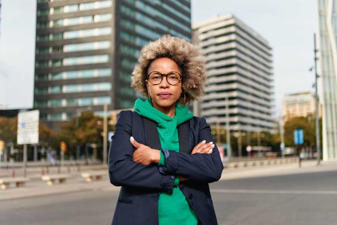 A woman crossing her arms A woman crossing her arms