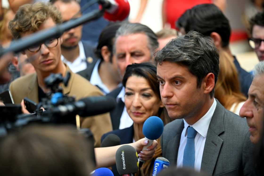 Gabriel Attal (R) is trying to turn the government's fortunes around Gabriel Attal (R) is trying to turn the government's fortunes around