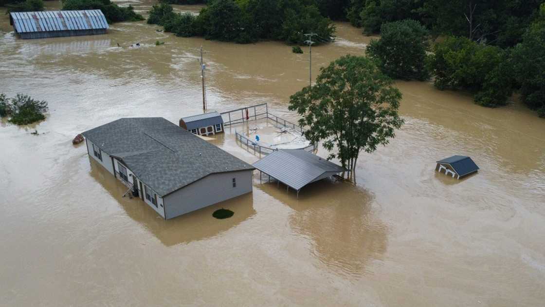 Homes submerged under flood waters from the North Fork of the Kentucky River are seen from a drone in Jackson, Kentucky Homes submerged under flood waters from the North Fork of the Kentucky River are seen from a drone in Jackson, Kentucky