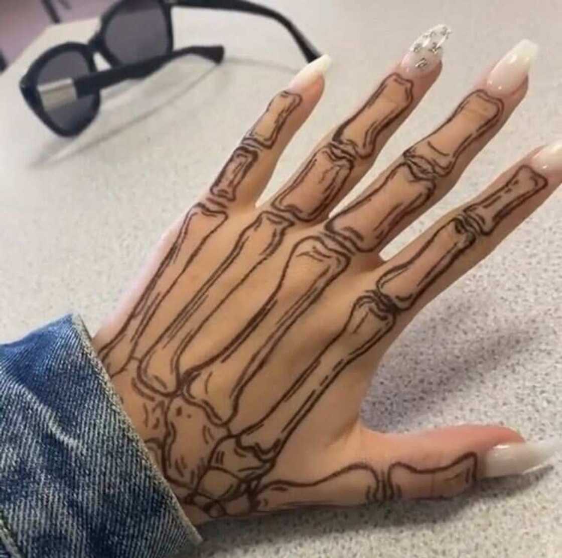 skeleton hand tattoo