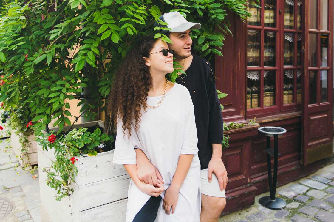 Happy couple visiting city farm