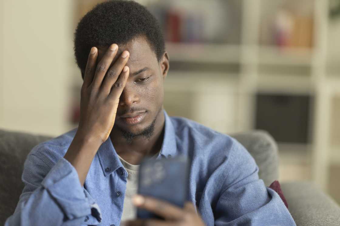 A frustrated man making a call A frustrated man making a call