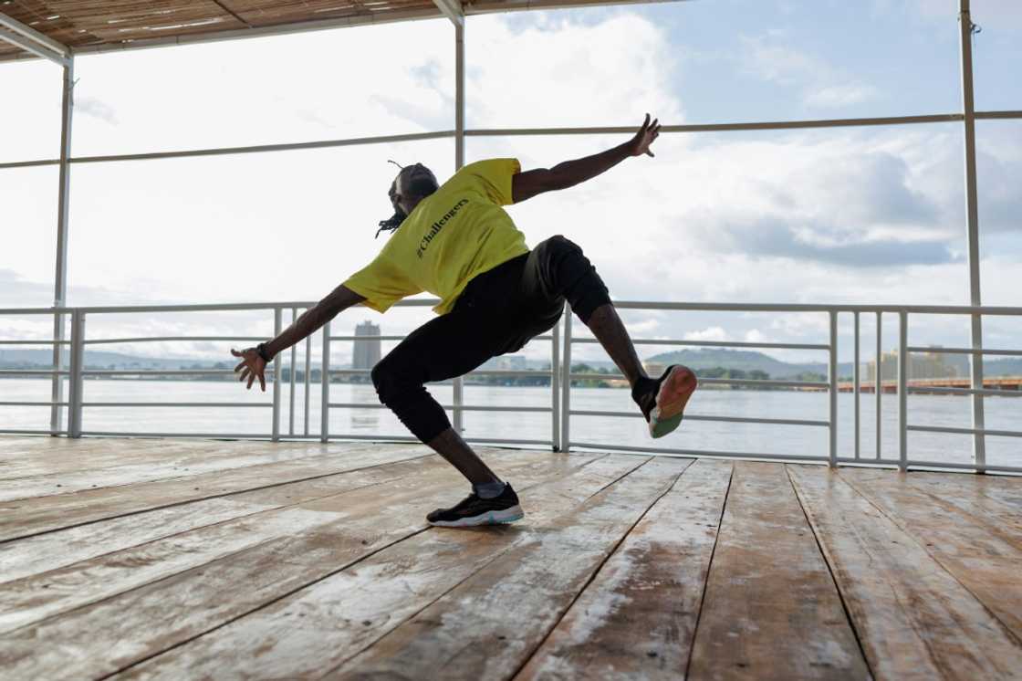 Limbering up: A dancer gets ready for showtime on Mali's floating arts venue