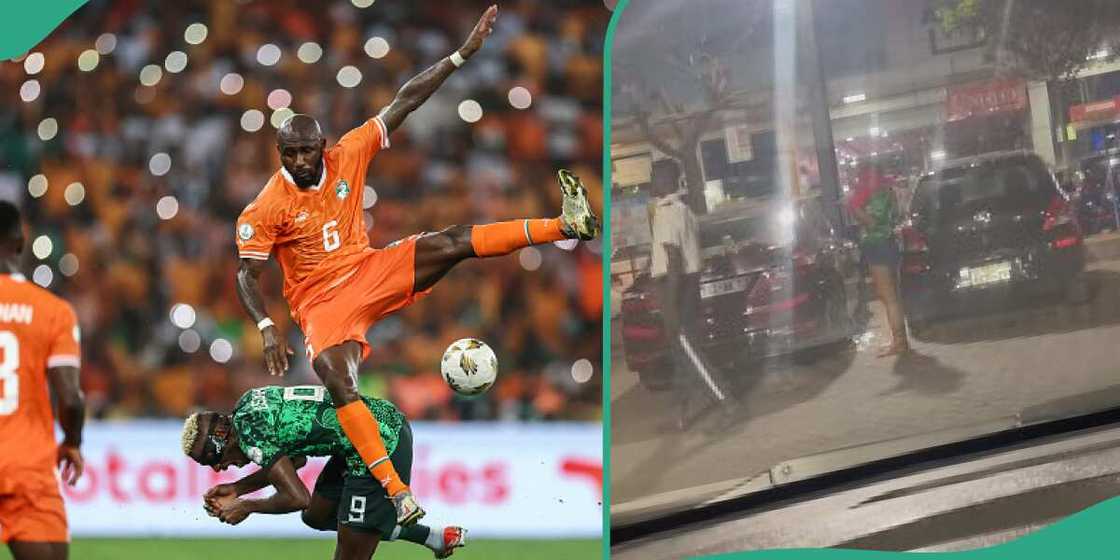 Netizens amused after lady was spotted hiding her Super Eagles jersey Netizens amused after lady was spotted hiding her Super Eagles jersey