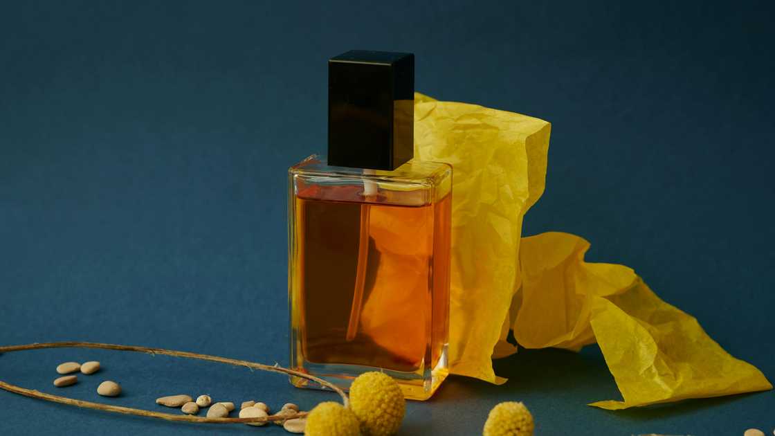 A close-up shot of a bottle of perfume A close-up shot of a bottle of perfume