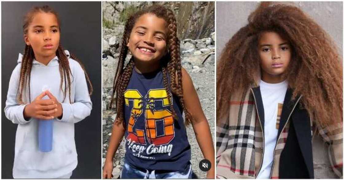 Child model flaunts his long braids.