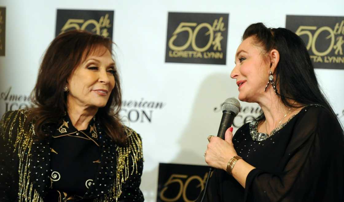 Loretta Lynn (L) is seen here with younger sister and fellow singer Crystal Gayle in 2010 Loretta Lynn (L) is seen here with younger sister and fellow singer Crystal Gayle in 2010