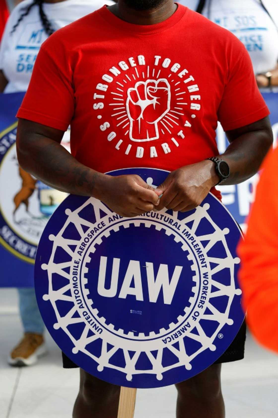 The prospect of a strike by an emboldened United Auto Workers union has dampened the mood at this year's Detroit Auto Show The prospect of a strike by an emboldened United Auto Workers union has dampened the mood at this year's Detroit Auto Show