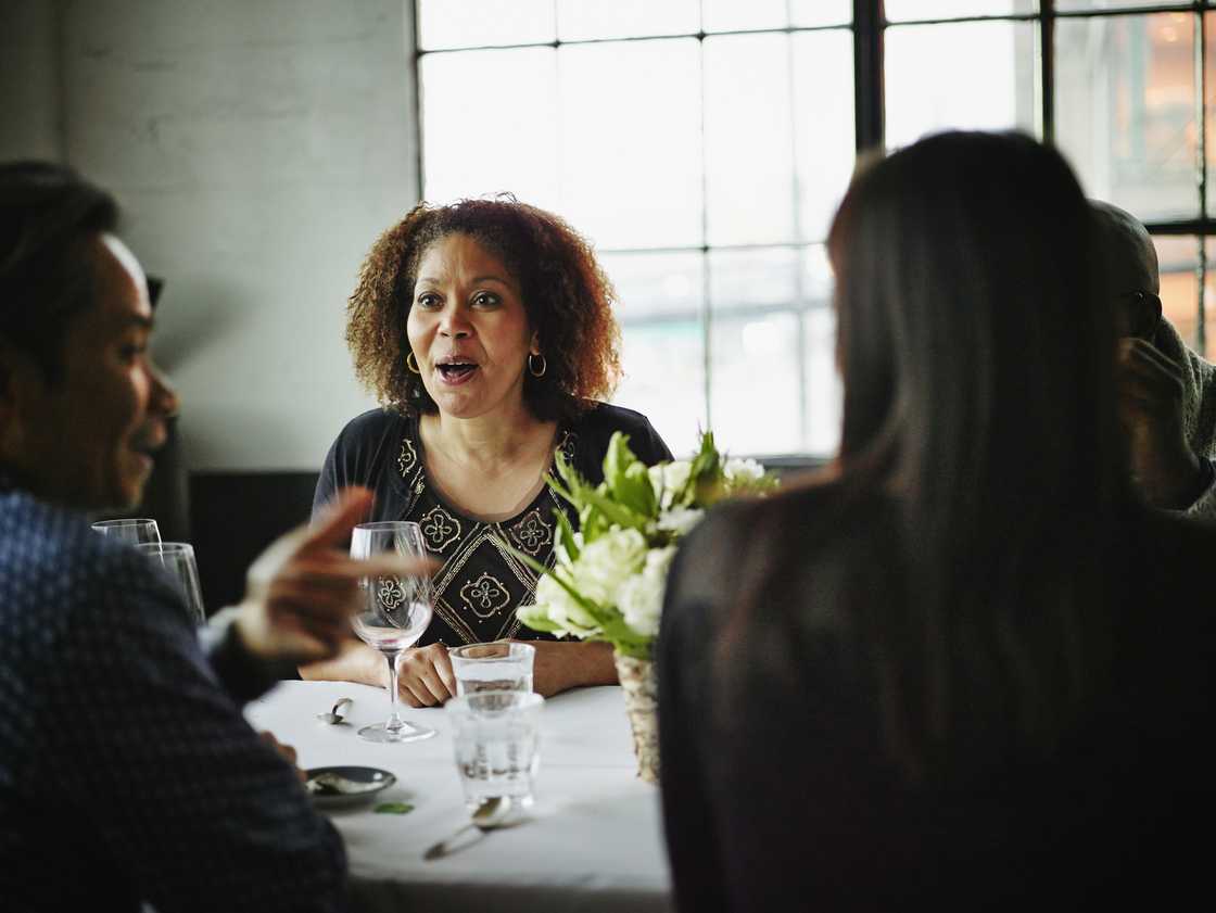 A group of people in a party A group of people in a party