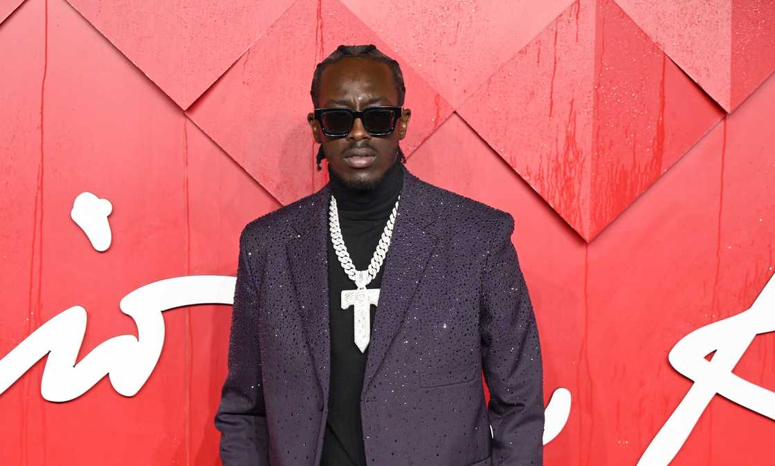 British rapper Unknown T attends The Fashion Awards 2023. British rapper Unknown T attends The Fashion Awards 2023.