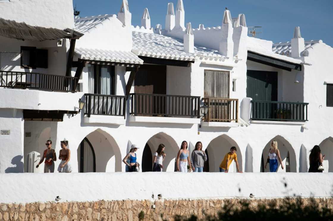 Every year, nearly 800,000 tourists flock to Binibeca Vell to have their photographs taken inside this picturesque whitewashed village Every year, nearly 800,000 tourists flock to Binibeca Vell to have their photographs taken inside this picturesque whitewashed village