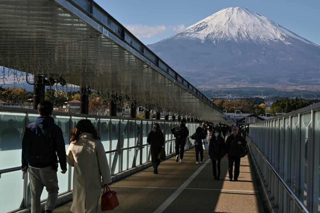 Authorities have introduced a daily cap on the number of hikers climbing Mount Fuji Authorities have introduced a daily cap on the number of hikers climbing Mount Fuji