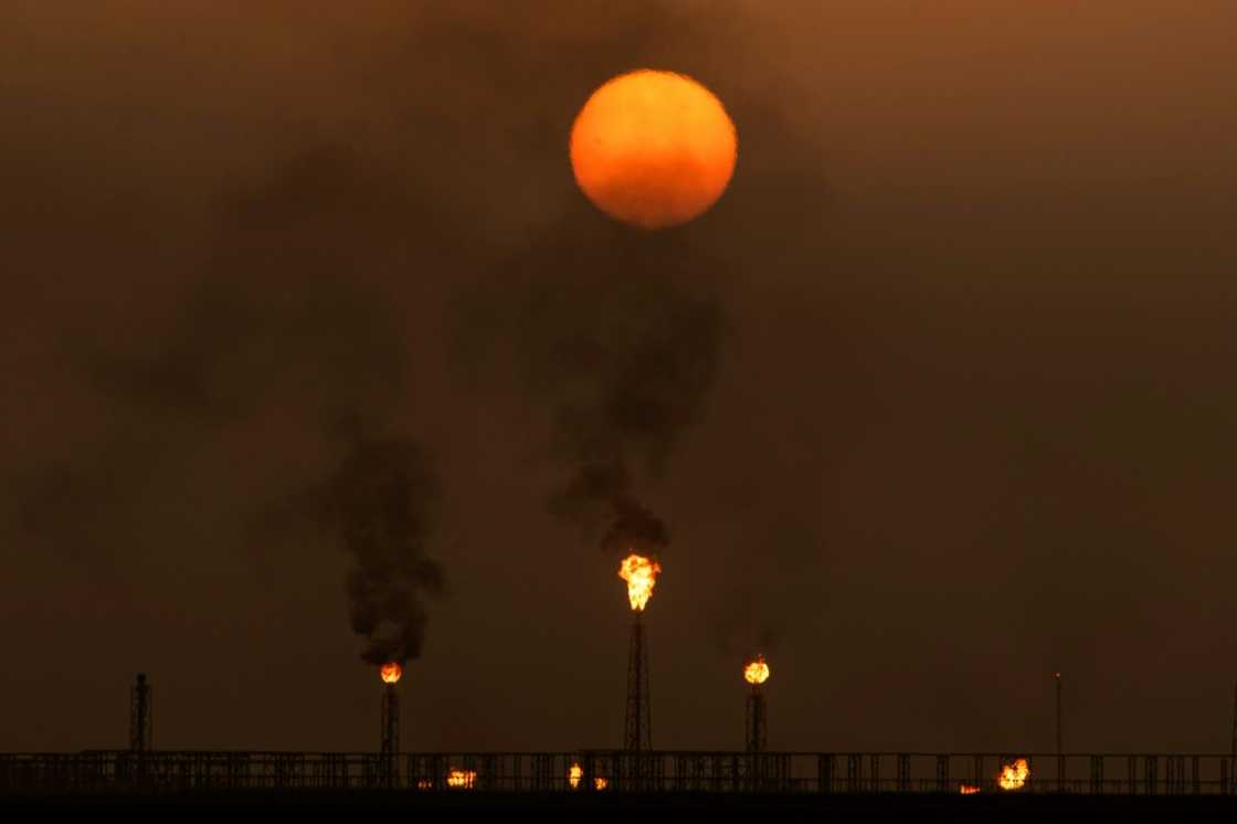 Flare stacks burn off excess gas at the Zubair oil and gas field north of the Iraqi province of Basra Flare stacks burn off excess gas at the Zubair oil and gas field north of the Iraqi province of Basra