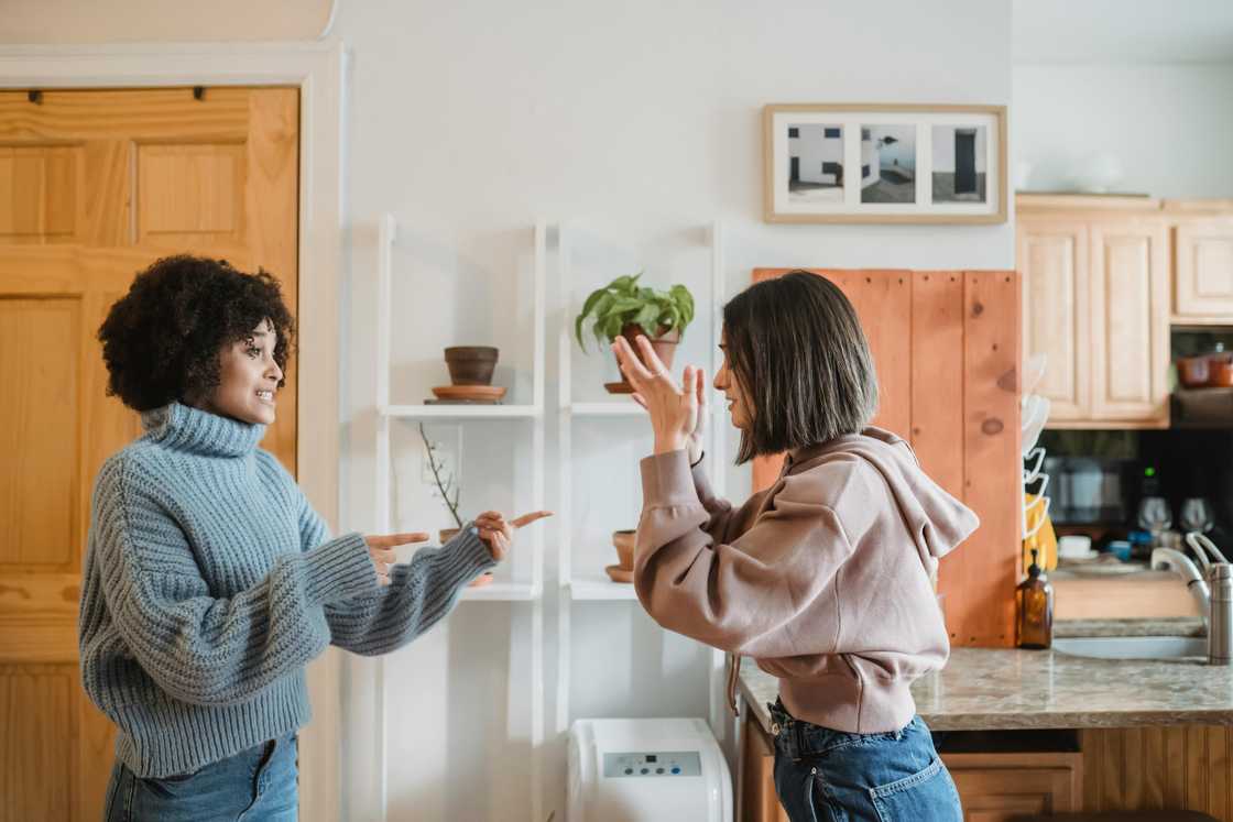 Two women arguing Two women arguing