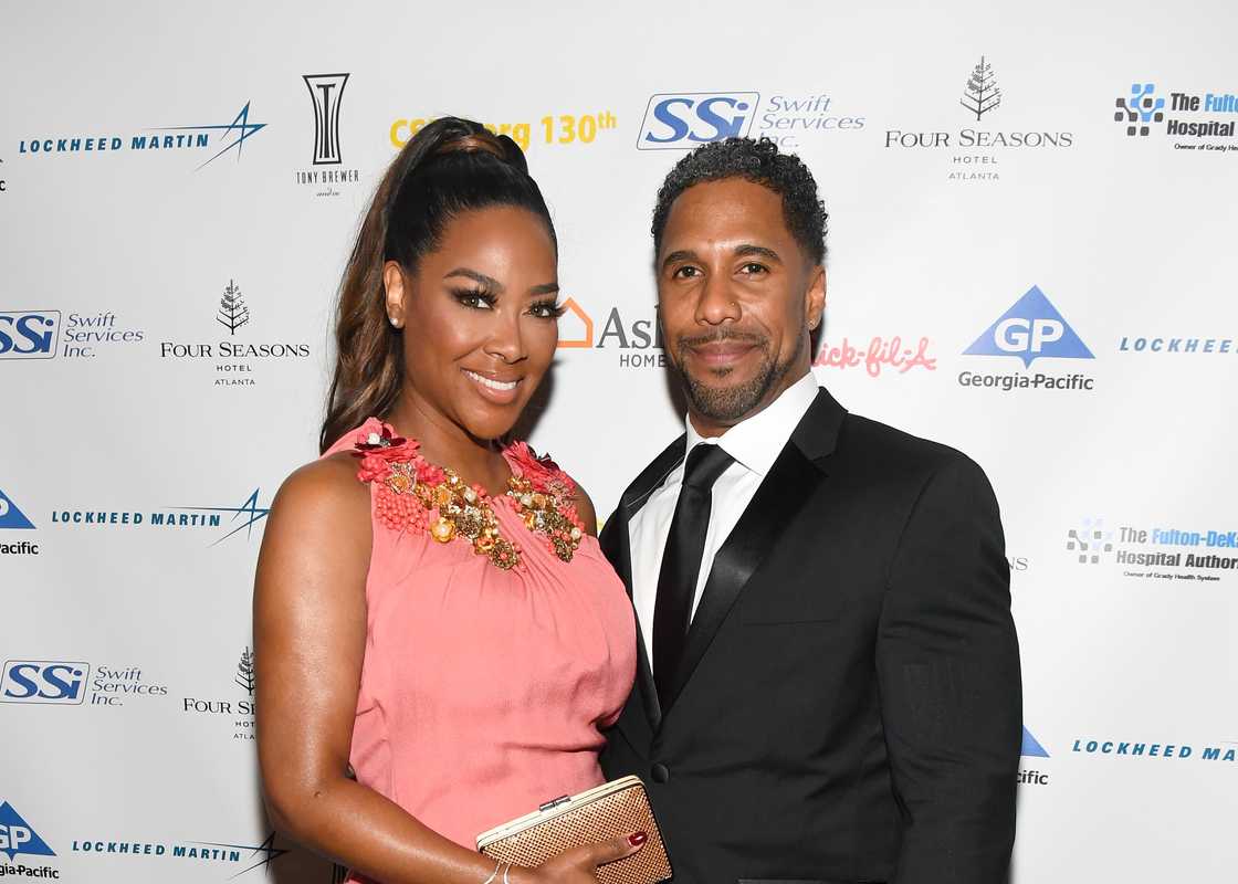 TV personality Kenya Moore (L) and Marc Daly pose at an event in Atlanta, Georgia. TV personality Kenya Moore (L) and Marc Daly pose at an event in Atlanta, Georgia.