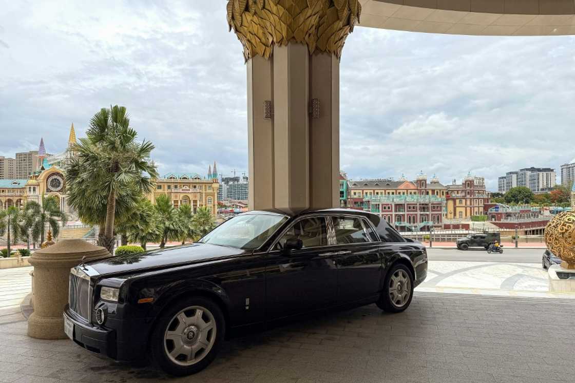 A Rolls-Royce parked outside the centerpiece Kings Romans Casino, part of the Kings Romans Group founded by Chinese businessman Zhao Wei, who is under US and British sanctions A Rolls-Royce parked outside the centerpiece Kings Romans Casino, part of the Kings Romans Group founded by Chinese businessman Zhao Wei, who is under US and British sanctions
