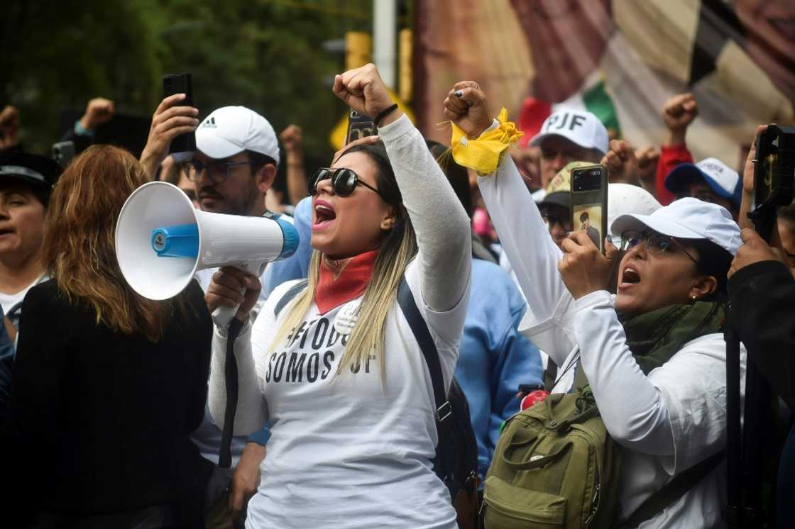 Opponents of Mexico's controversial judicial reforms protest outside the Senate after the bill was passed Opponents of Mexico's controversial judicial reforms protest outside the Senate after the bill was passed
