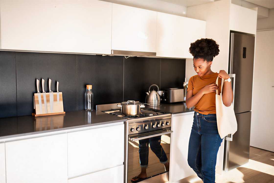 A young woman is arriving home