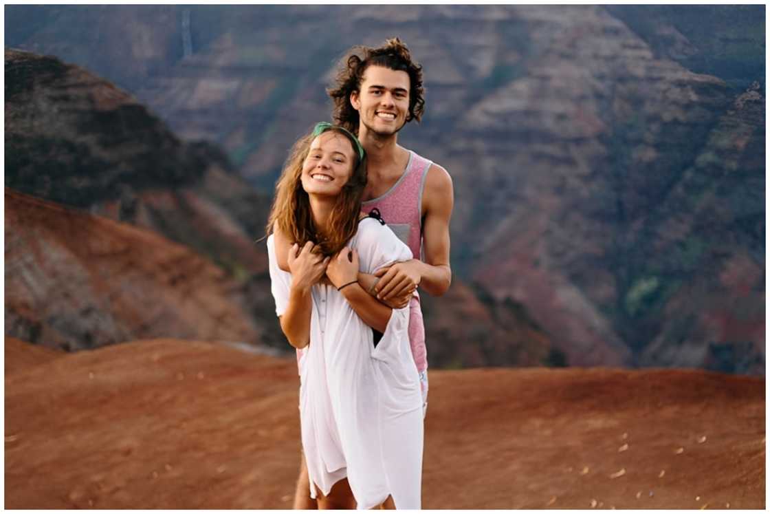 Mary in a white dress and Luke in a vest. Mary in a white dress and Luke in a vest.