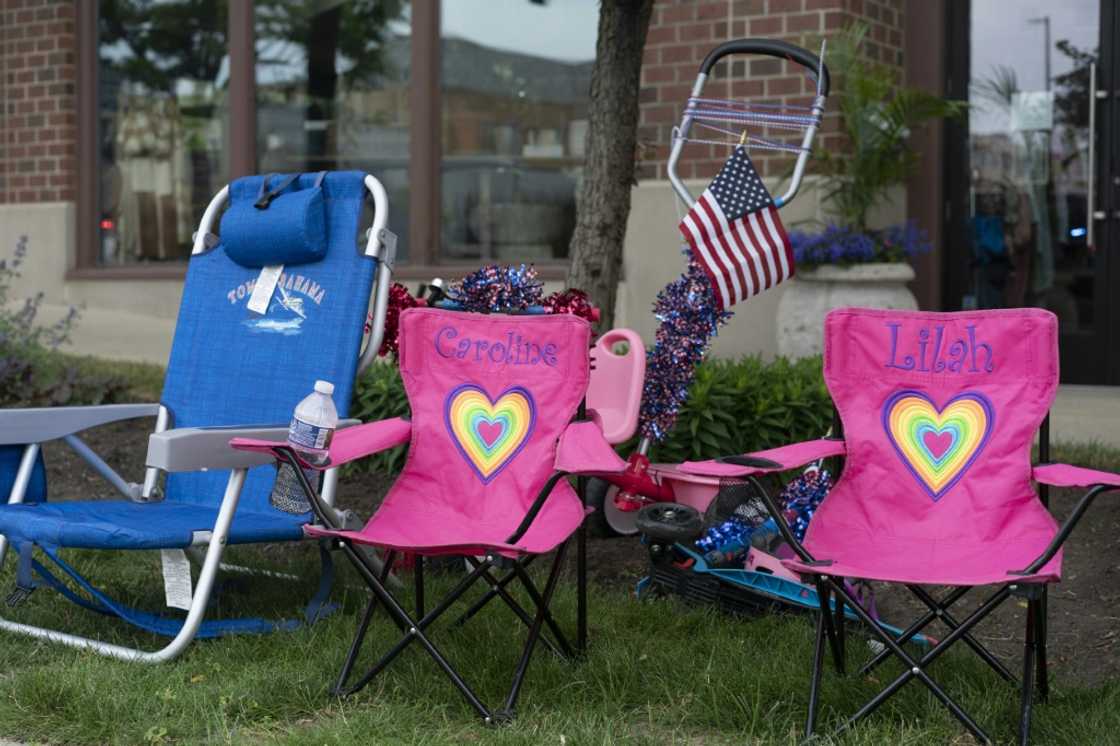 Lawn chairs stand at the scene of the Fourth of July parade shooting in Highland Park, Illinois on July 4, 2022 Lawn chairs stand at the scene of the Fourth of July parade shooting in Highland Park, Illinois on July 4, 2022