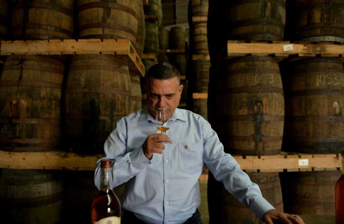 Cuban rum master Asbel Morales tastes Havana Club rum in Cuba in March 2018. Cuban rum master Asbel Morales tastes Havana Club rum in Cuba in March 2018.