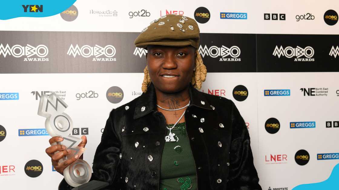 Darkoo poses with the song of the year award at the MOBO Awards 2025. Darkoo poses with the song of the year award at the MOBO Awards 2025.