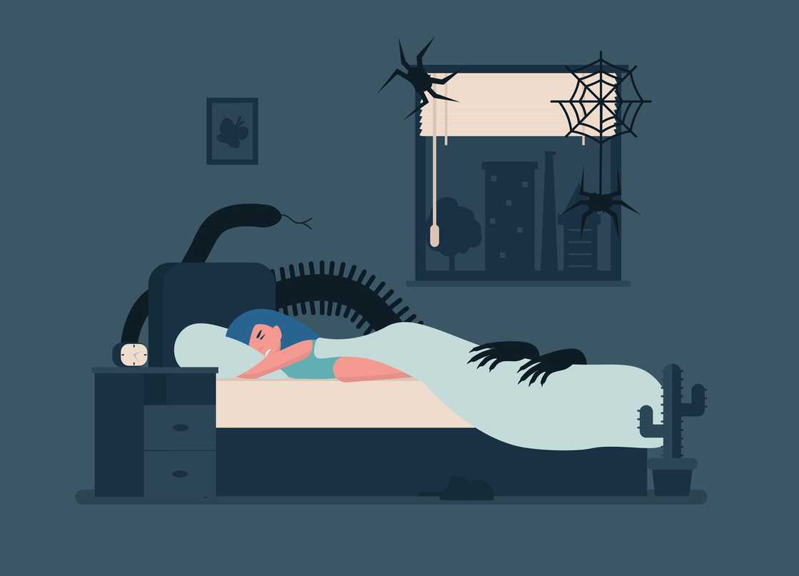 Woman in bed having nightmares about spiders
