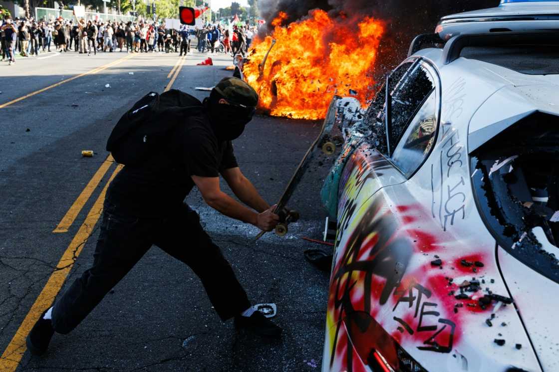 In Los Angeles, the vehicles became a target of protesters against the White House's immigration policies