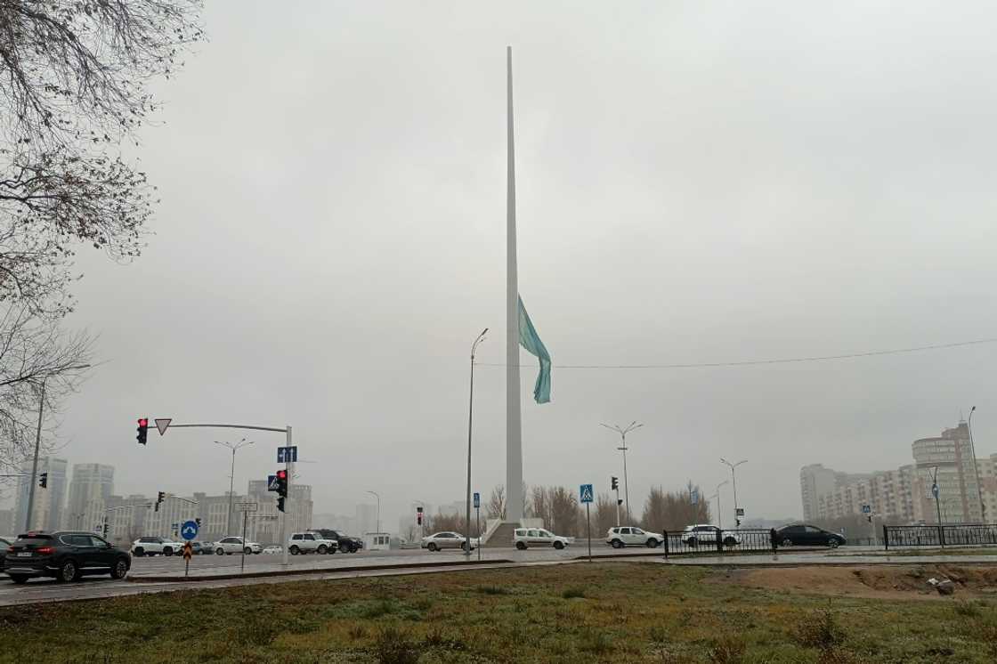 The Kazakh national flag flies at half-mast to mark a day of national mourning for the dead miners The Kazakh national flag flies at half-mast to mark a day of national mourning for the dead miners