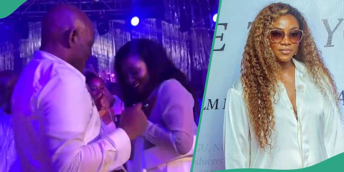 Actress Genevieve Nnaji and Tony Elumelu dancing