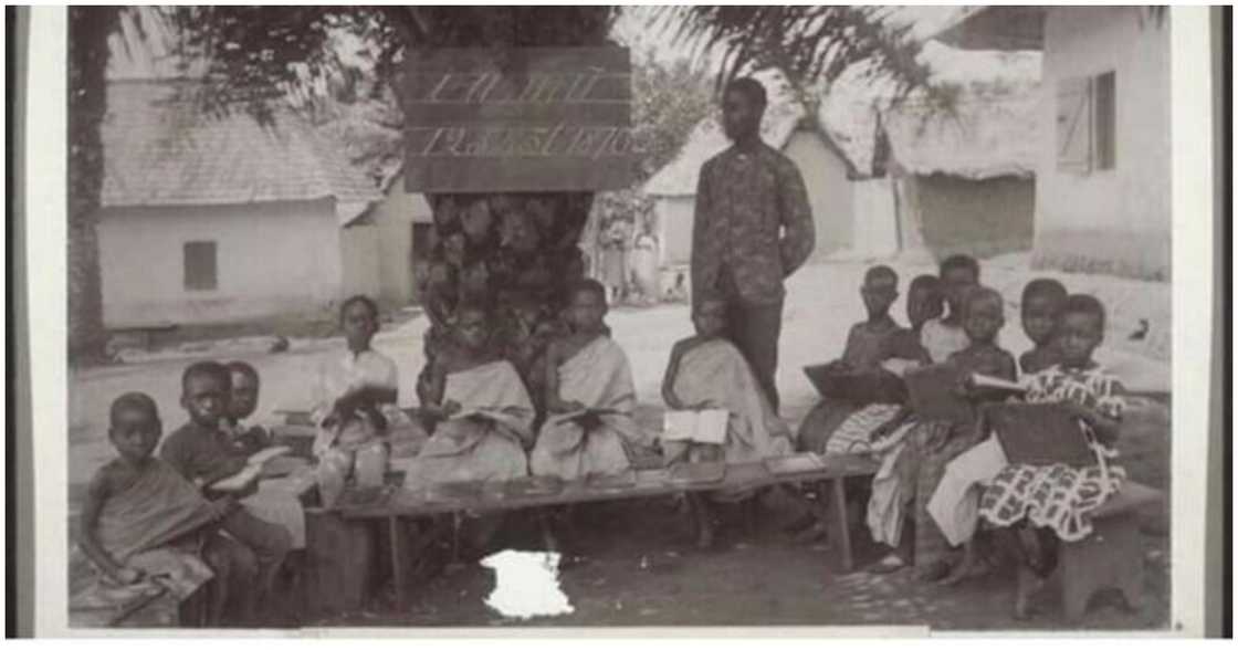 A teacher with his school kids in 1912