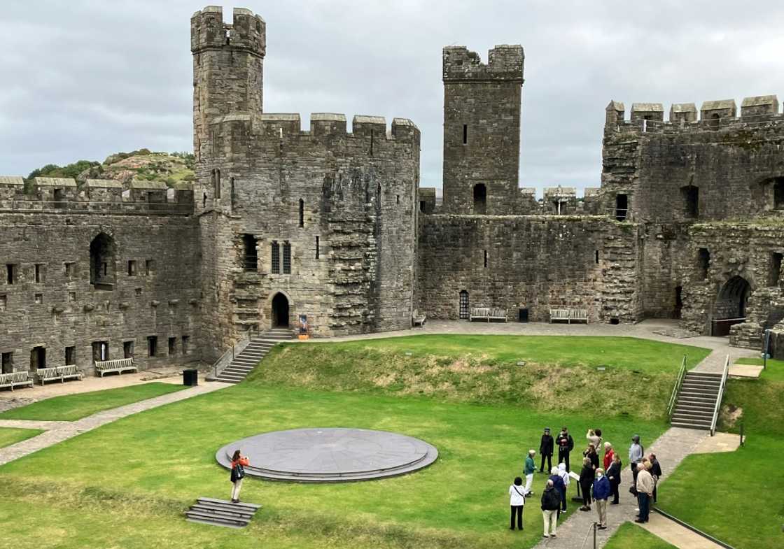 Caernarfon Castle was built in the 13th century by King Edward I Caernarfon Castle was built in the 13th century by King Edward I