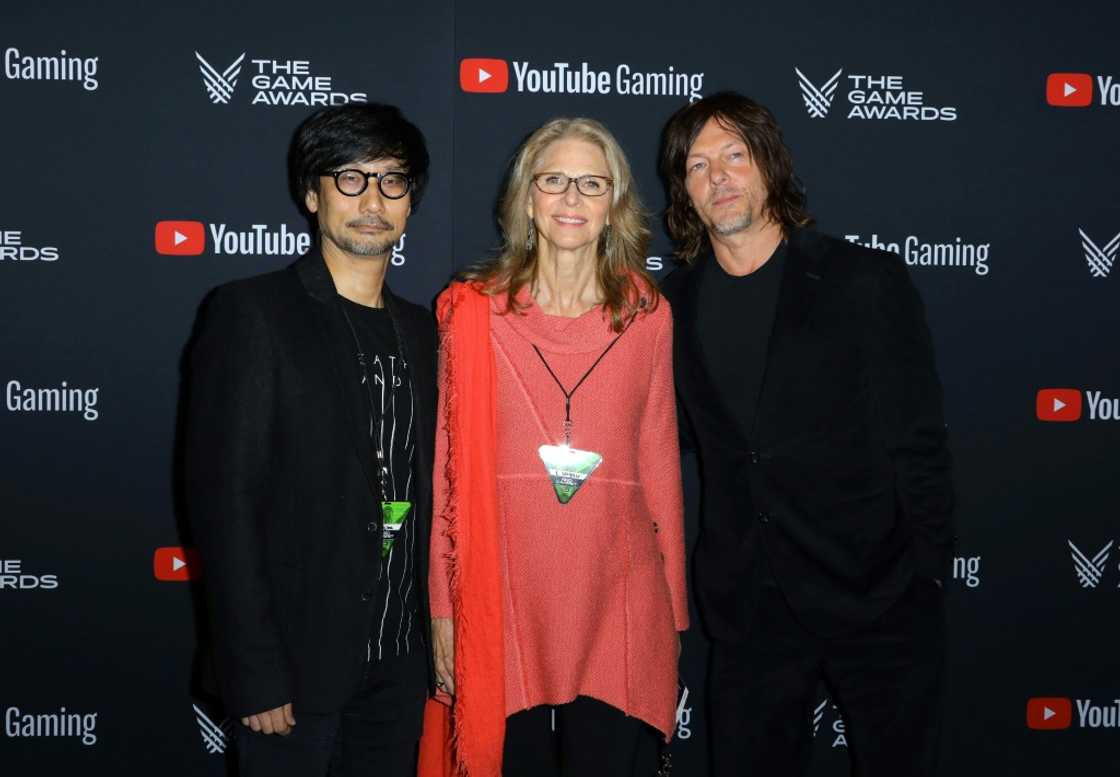 Japanese video game maker Hideo Kojima (L) with actors Lindsay Wagner and Norman Reedus, who featured in 'Death Stranding'