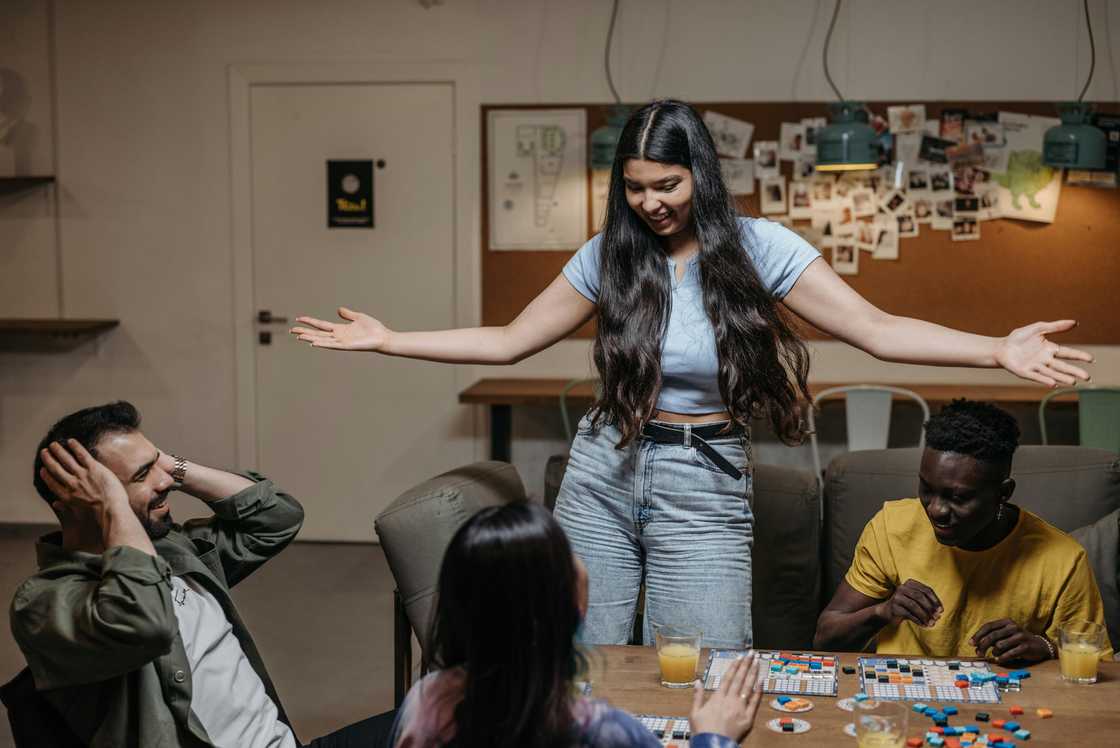 Friends playing a board game