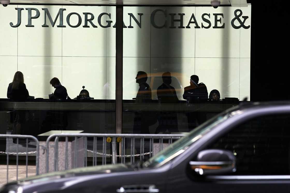 JPMorgan Chase reported lower quarterly profits as it set aside more funds in case of bad loans JPMorgan Chase reported lower quarterly profits as it set aside more funds in case of bad loans