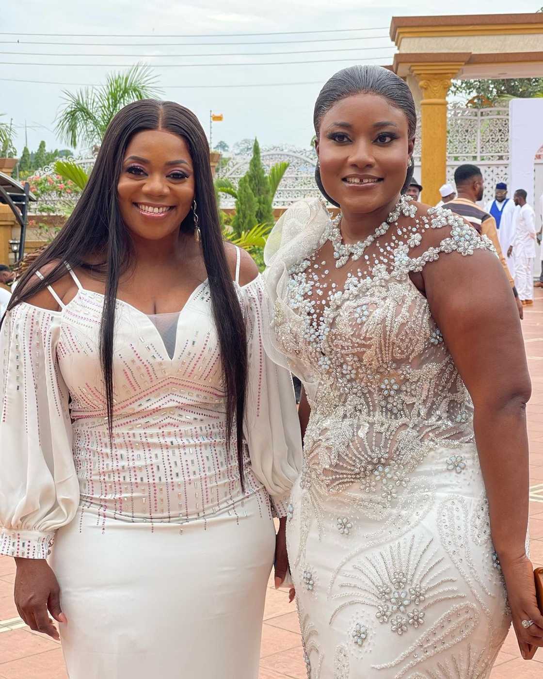 Anita Sefa Boakye and Piesie Esther slay in their white dresses.