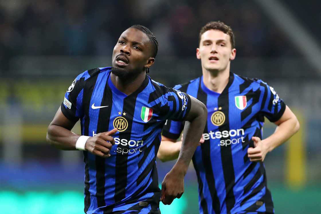 Marcus Thuram of FC Internazionale celebrates scoring his team's first goal during the UEFA Champions League 2024/25 Round of 16 Second Leg match between FC Internazionale Milano and Feyenoord at Stadio San Siro on March 11, 2025 in Milan, Italy Marcus Thuram of FC Internazionale celebrates scoring his team's first goal during the UEFA Champions League 2024/25 Round of 16 Second Leg match between FC Internazionale Milano and Feyenoord at Stadio San Siro on March 11, 2025 in Milan, Italy