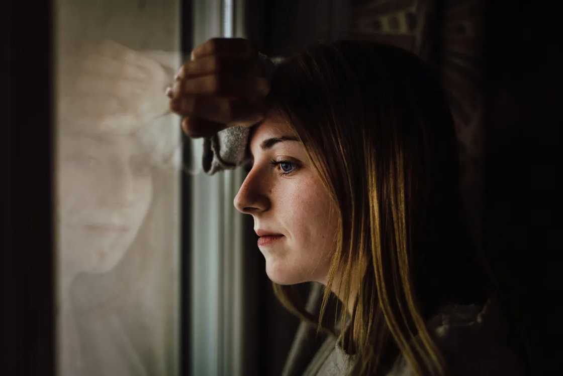 Woman near the window